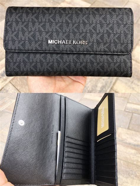 michael kors travel wallet uk|Michael Kors trifold wallet black.